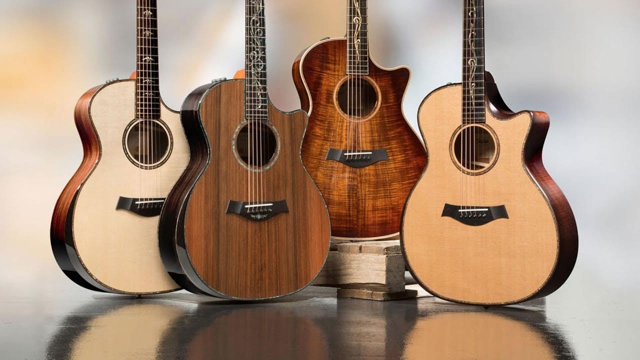 room full of guitars on wall and on couch